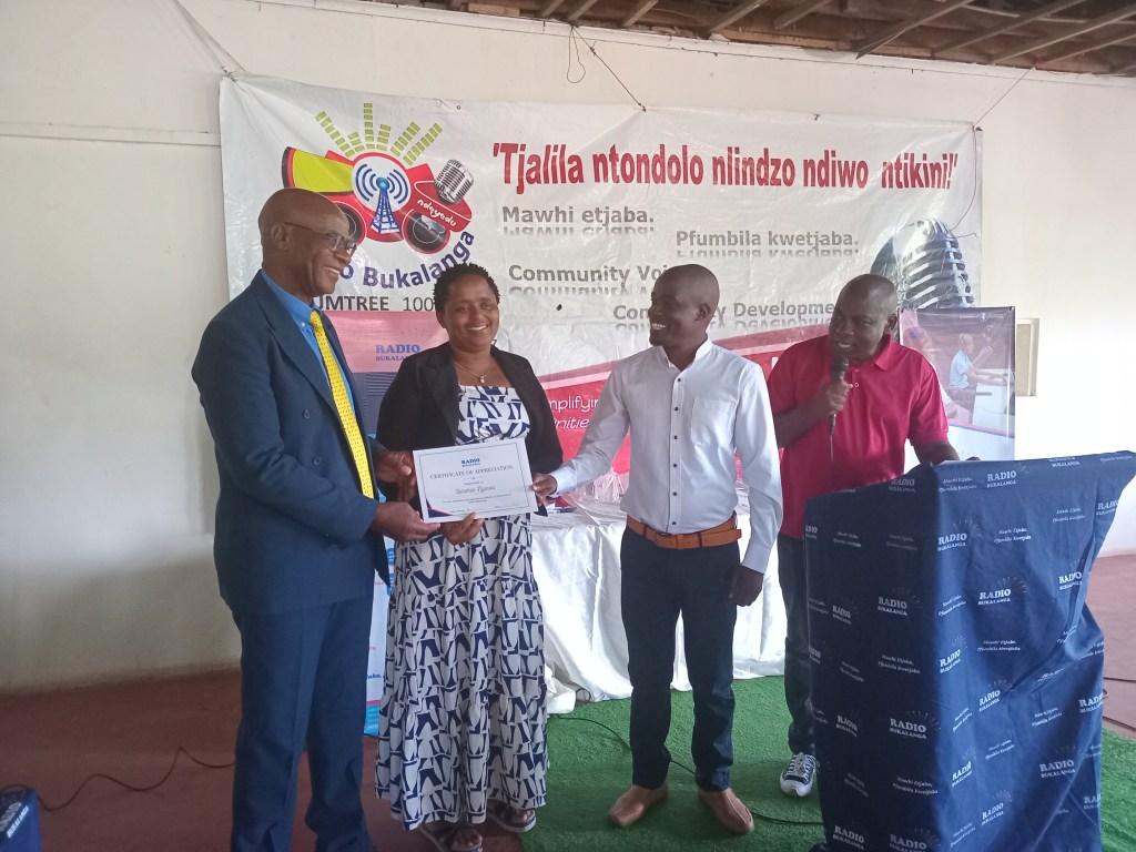 Lady D receiving her certificate of&nbsp;Appreciation